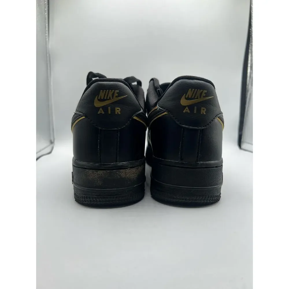 Nike Air Force 1 Low ‘07 Essential “Black Gold Swoosh” size 7.5 women’s used